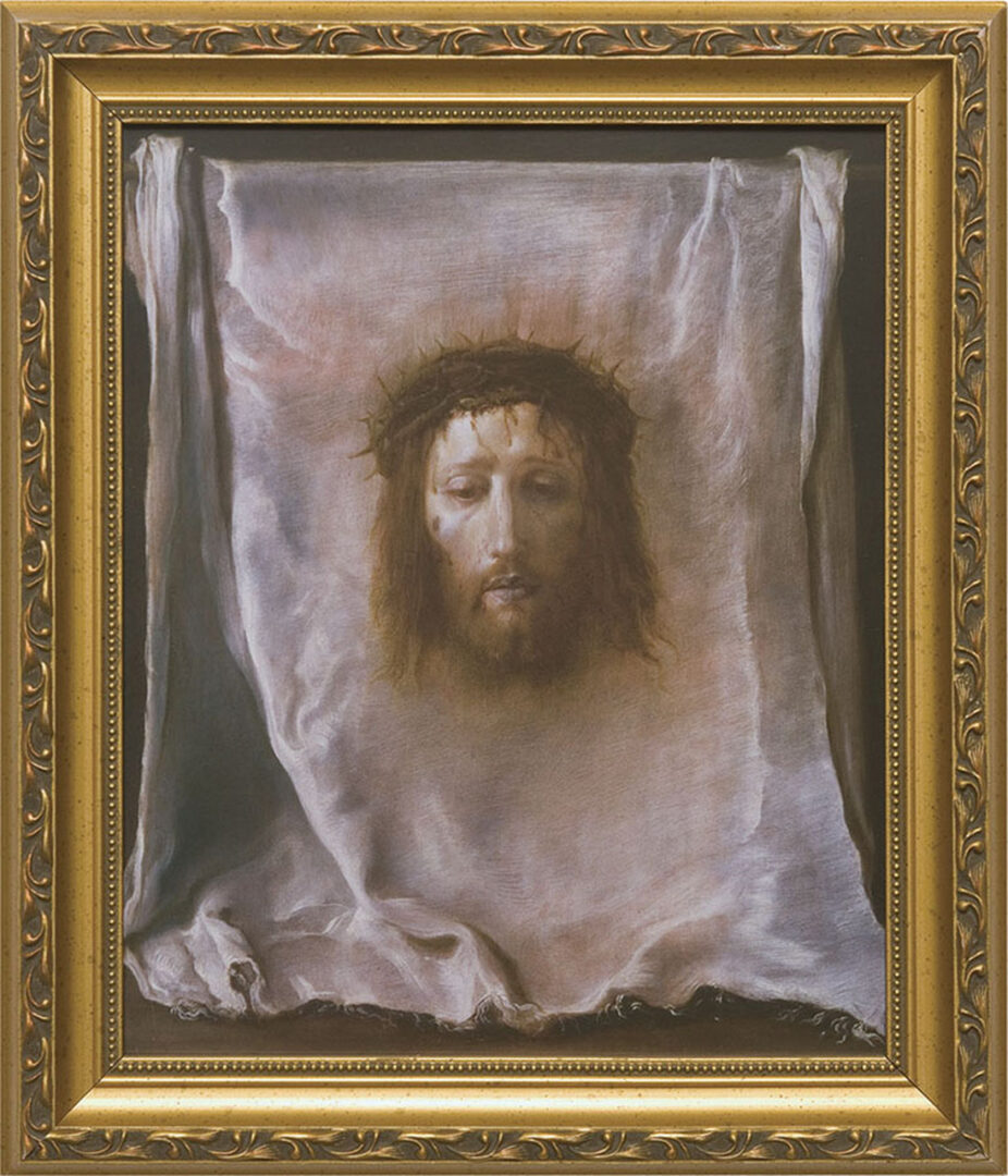A painting of jesus with a gold frame.