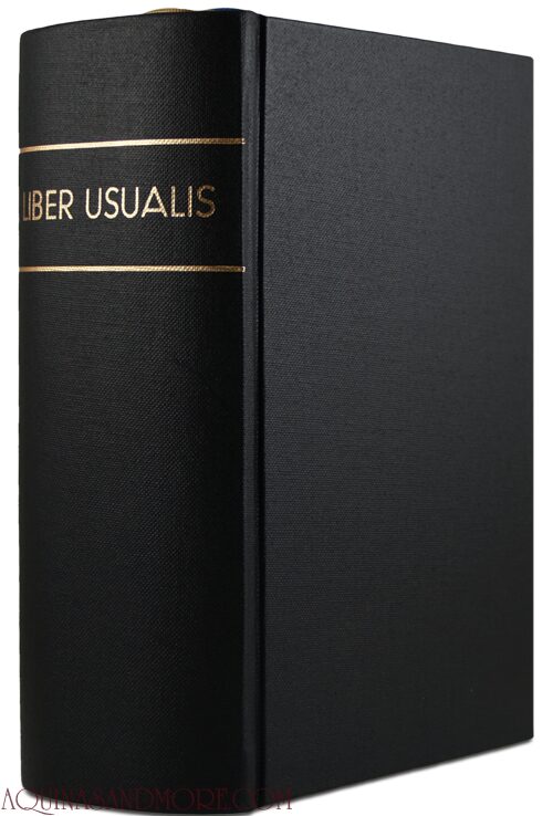 A black book with the word 'Liber Usualis' on it.