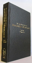 A Manual of Dogmatic Theology Volume 1 with a gold cover on a white surface.