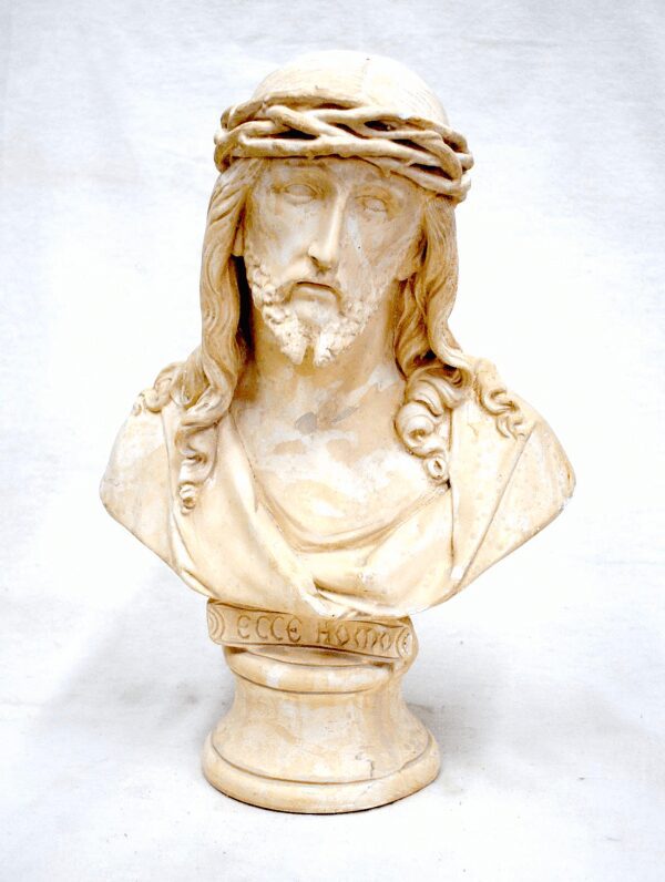 A bust of jesus wearing a crown of thorns.